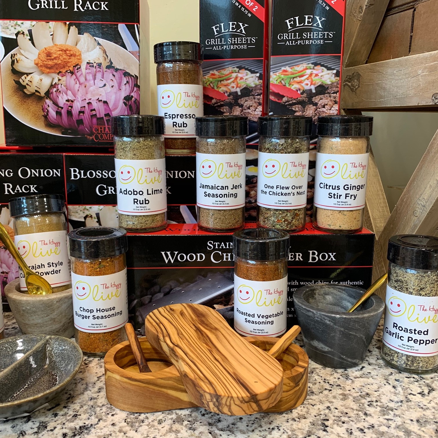 https://alabama-travel.s3.amazonaws.com/partners-uploads/photo/image/5ff206c026ed6d0007f93508/Mountain Brook Olive Co spices and grilling supplies.JPG